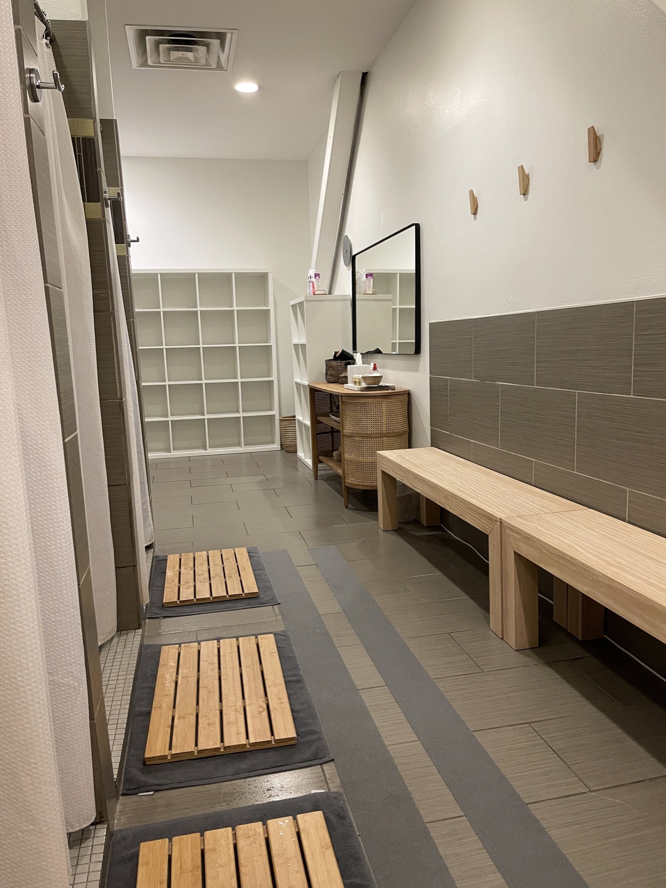 Locker room showers at SWEAT